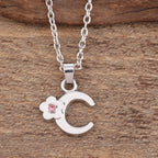 Necklace with initial and flower pendant c