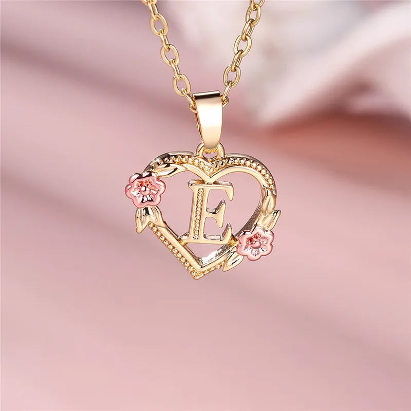 Heart and flowers initial pendant necklace e