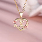 Heart and flowers initial pendant necklace x