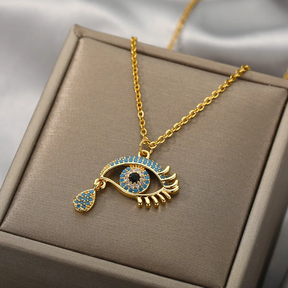 Necklace with Blue Turkish Evil Eye Zircon Pendant that is crying gold