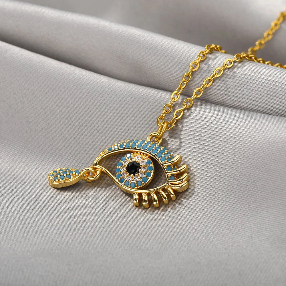 Necklace with Blue Turkish Evil Eye Zircon Pendant that is crying gold