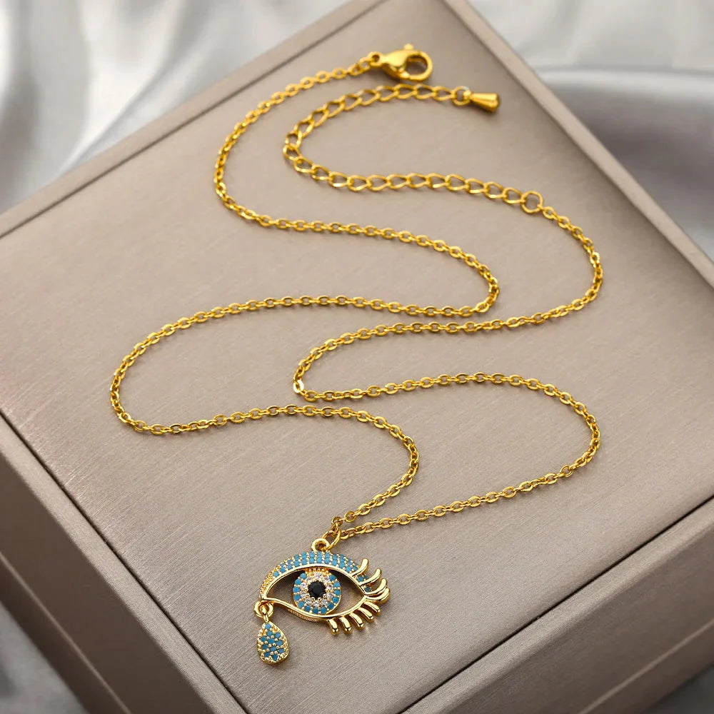 Necklace with Blue Turkish Evil Eye Zircon Pendant that is crying gold