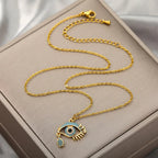 Necklace with Blue Turkish Evil Eye Zircon Pendant that is crying gold