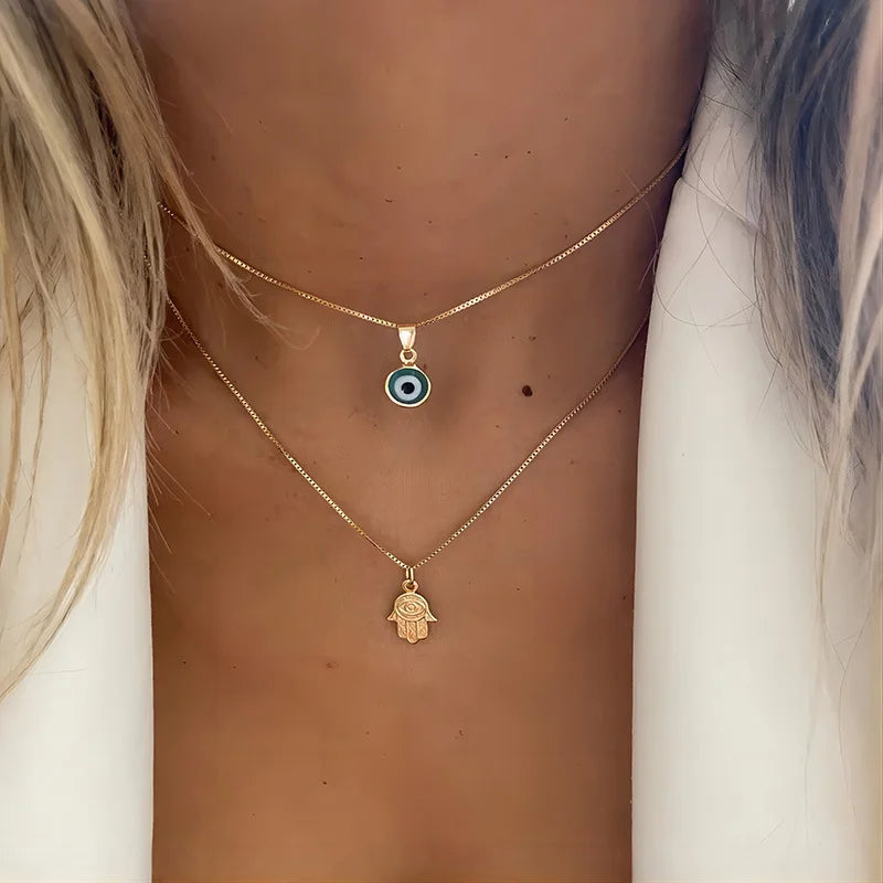Double Necklace with Turkish Blue Eye and Fatima's Hand Pendant gold