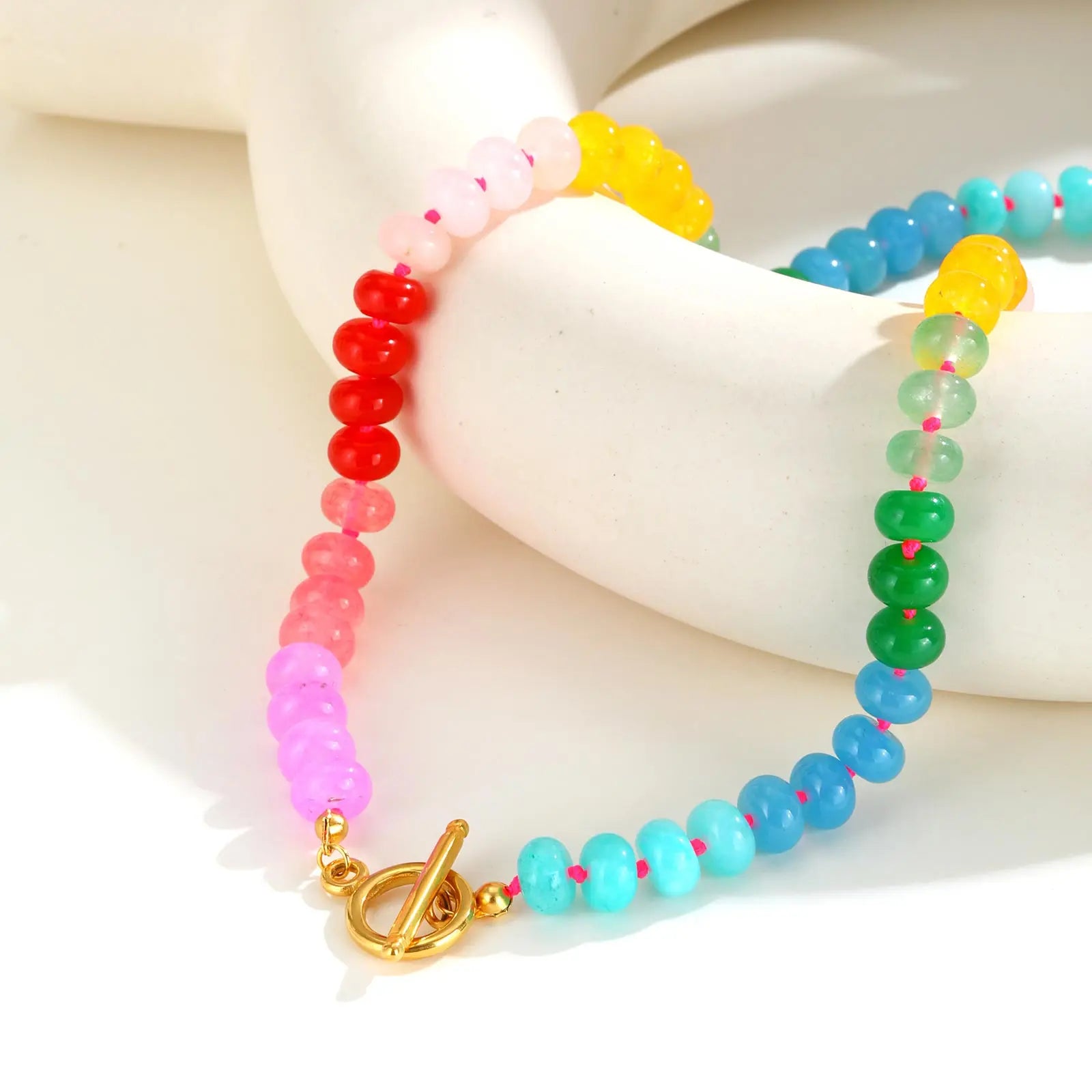 Necklace with rainbow pendant and pearls