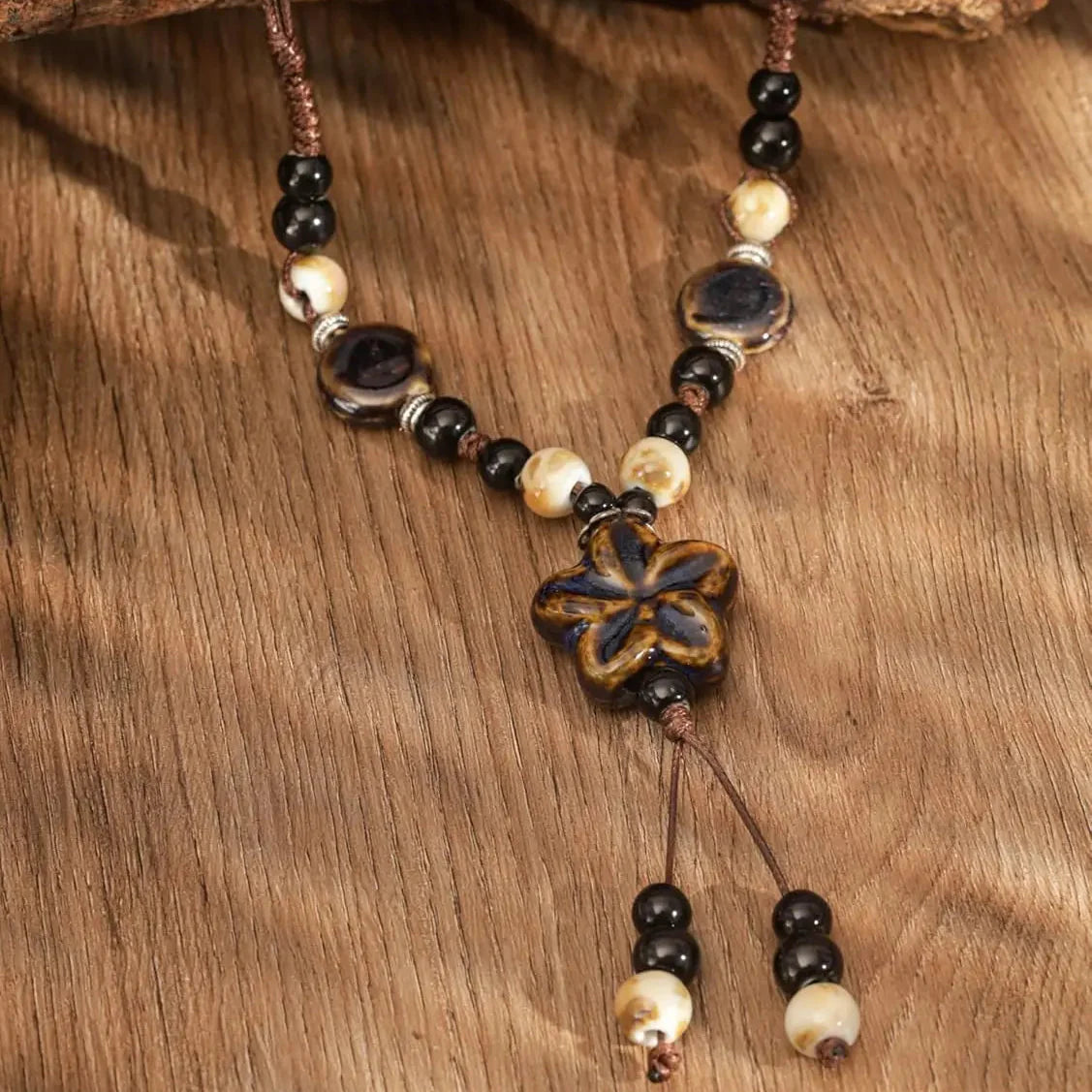 Beaded Necklace with Brown Flower Pendant