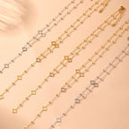Long Necklace with 4-Leaf Clover and Zircon Pendants gold