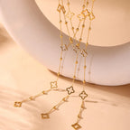 Long Necklace with 4-Leaf Clover and Zircon Pendants gold