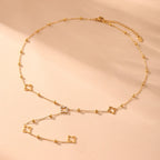 Long Necklace with 4-Leaf Clover and Zircon Pendants gold