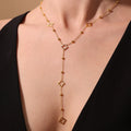 Long Necklace with 4-Leaf Clover and Zircon Pendants gold