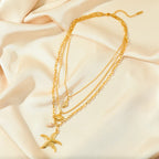 Multistrand Necklace with Shell Pendant, Starfish, Conch, Scallop Shell