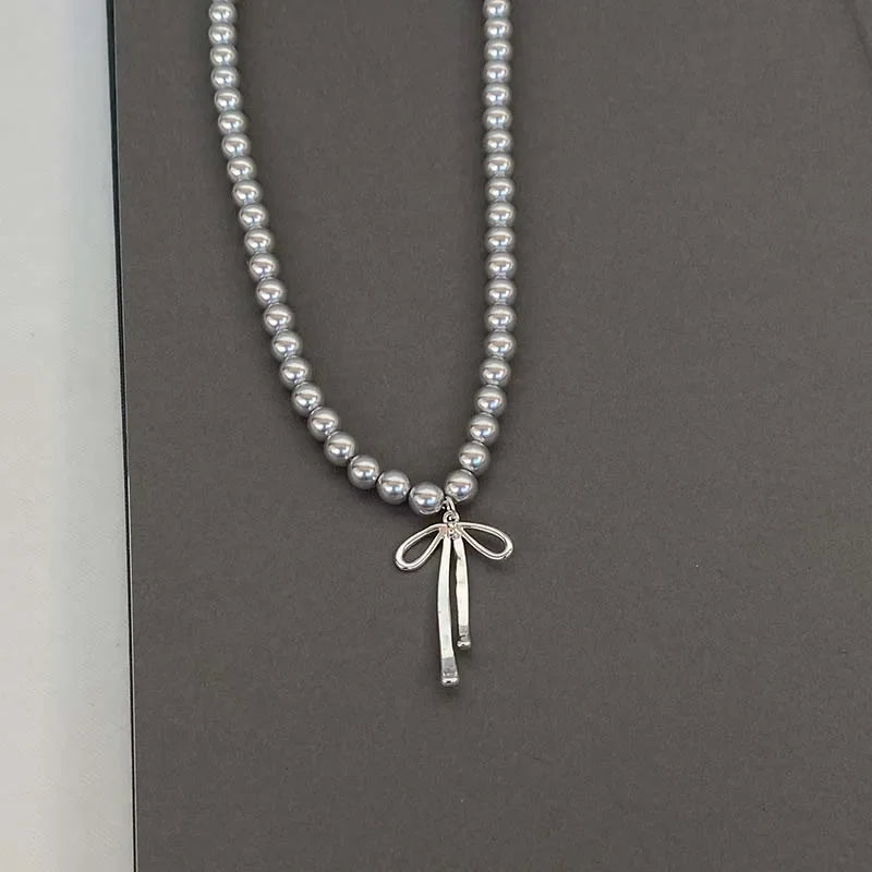 Pendant Necklace with Grey Pearls and Bow Tie 