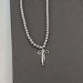Pendant Necklace with Grey Pearls and Bow Tie 