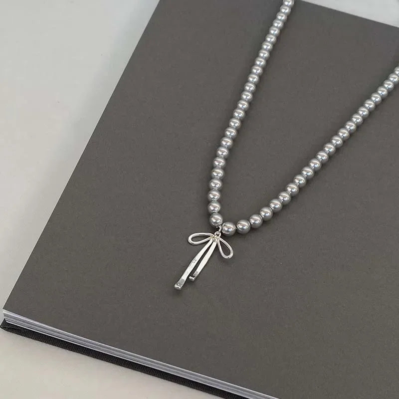 Pendant Necklace with Grey Pearls and Bow Tie 