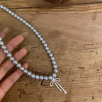 Pendant Necklace with Grey Pearls and Bow Tie 