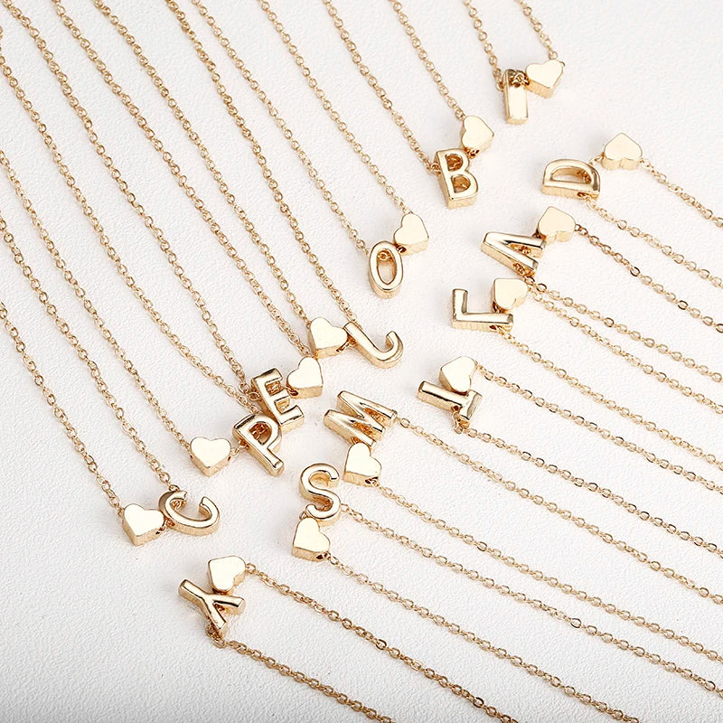 Women's necklace with initial pendant and heart