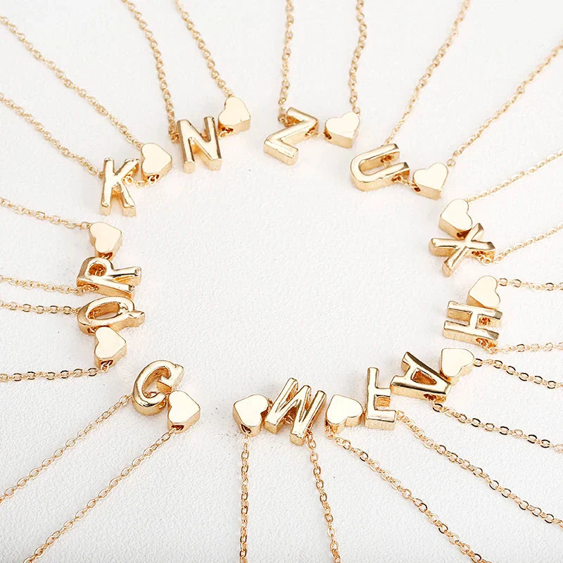 Women's necklace with initial pendant and heart