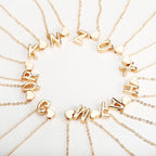 Women's necklace with initial pendant and heart
