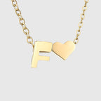 Women's necklace with heart pendant and initial - letter