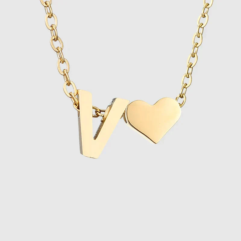 Women's necklace with heart pendant and initial - letter