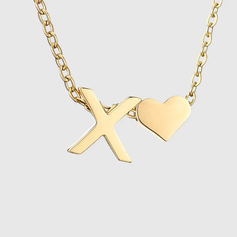 Women's necklace with heart pendant and initial - letter