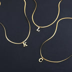 Women’s choker necklace with initial pendant