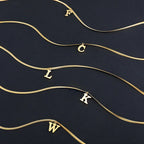 Women’s choker necklace with initial pendant