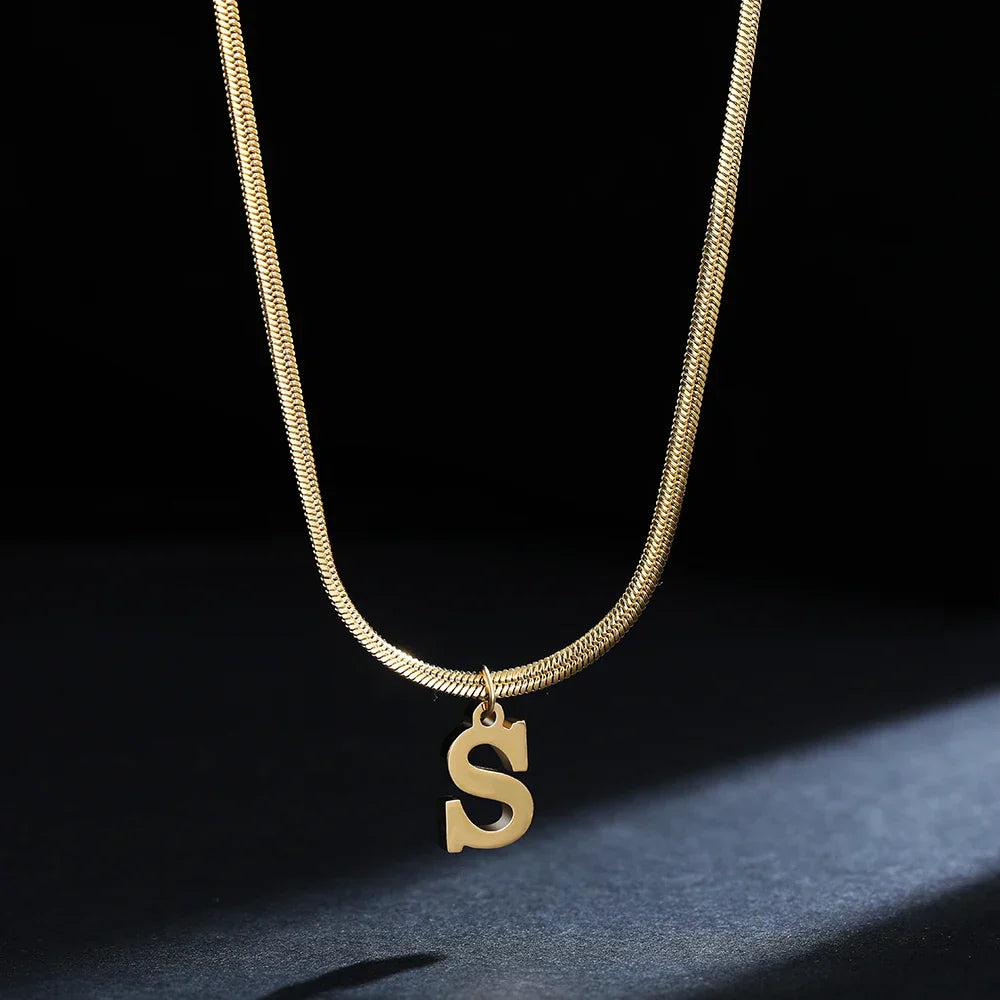 Women’s choker necklace with initial pendant s