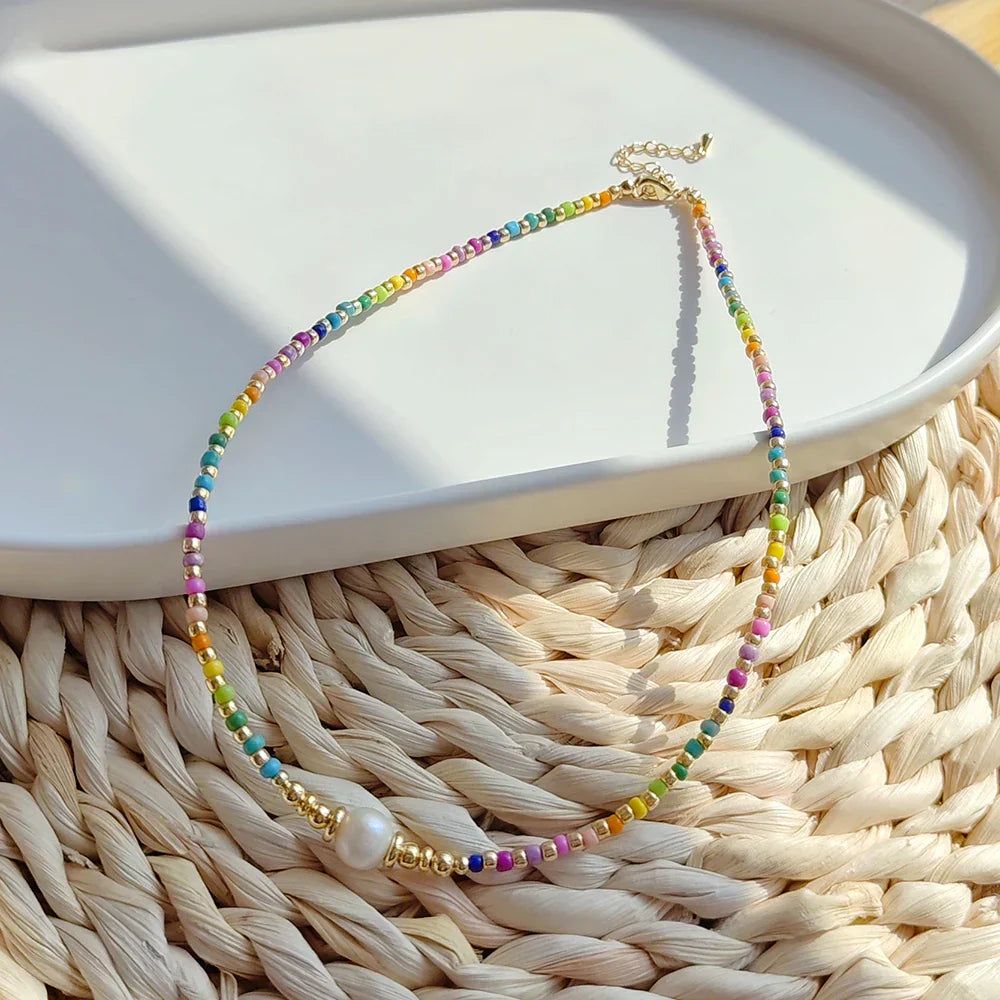 Choker necklace with rainbow pendant and pearls