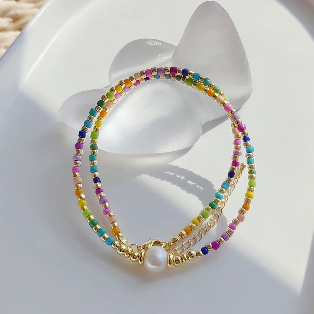 Choker necklace with rainbow pendant and pearls