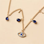 Choker Necklace with Turkish Blue Evil Eye Pendant, Rhinestones and Gold Beads