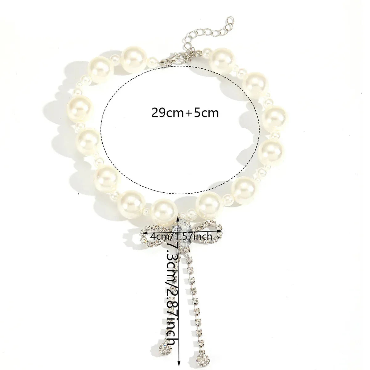 Choker necklace with rhinestone bow pendant