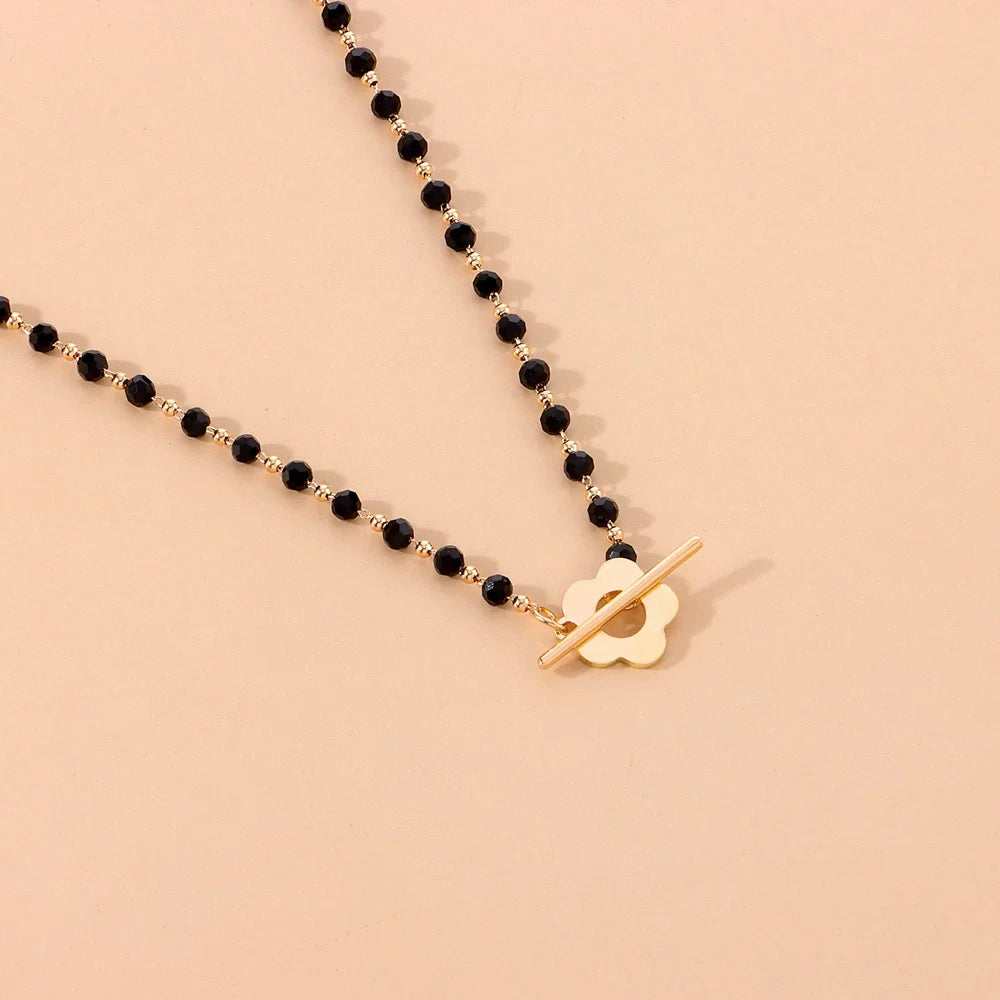 Floral Pendant Choker Necklace in Black and Gold