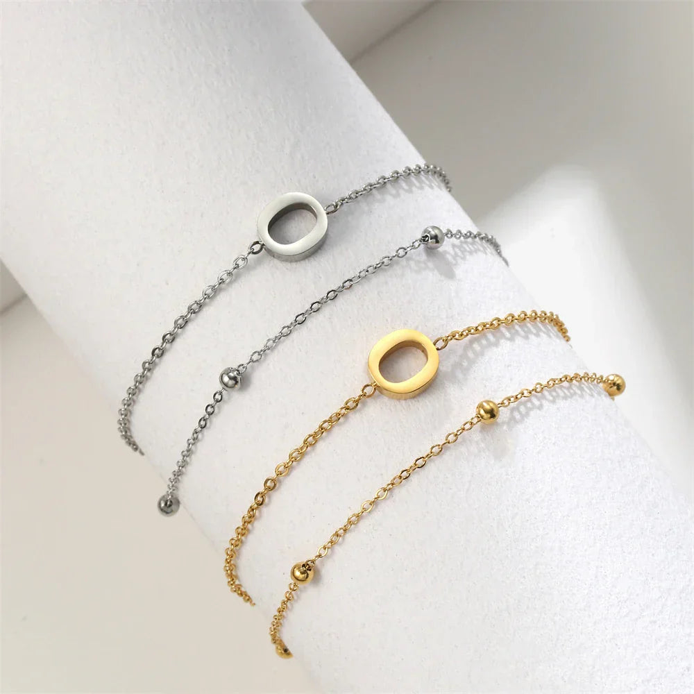 Double initial bracelet in gold and silver  o
