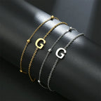 Double initial bracelet in gold and silver  g