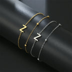 Double initial bracelet in gold and silver  z