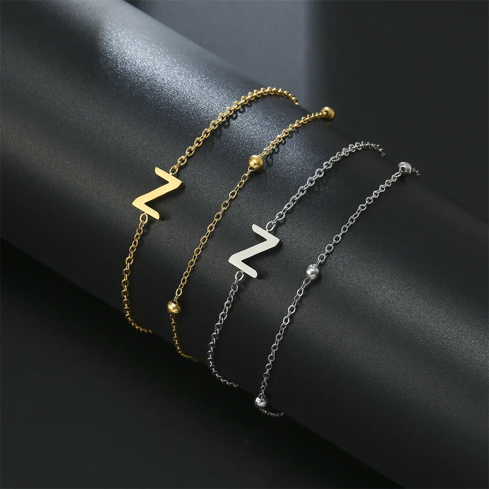 Double initial bracelet in gold and silver  z
