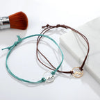 Set of 4 Rope Bracelets with Round Mountain Pendant