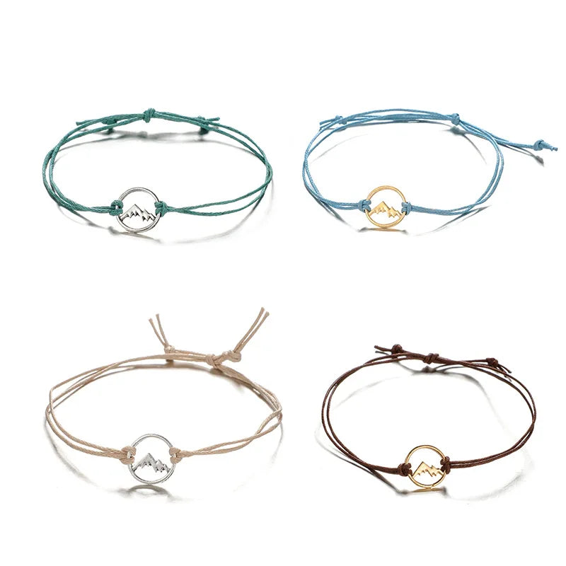 Set of 4 Rope Bracelets with Round Mountain Pendant