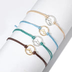 Set of 4 Rope Bracelets with Round Mountain Pendant