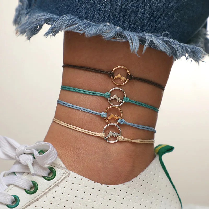 Set of 4 Rope Bracelets with Round Mountain Pendant