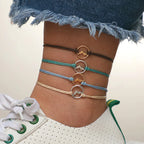 Set of 4 Rope Bracelets with Round Mountain Pendant